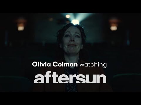 Olivia Colman watching the "Under Pressure" scene in Aftersun