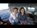 Two first-time divers exploring coral and colorful tropical fish at Horseshoe Reef, Oahu