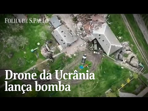 , title : 'Vídeo mostra drone ucraniano lançando bomba sobre soldados russos | CENAS DA GUERRA'