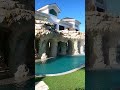 This pool has an insane lazy river underneath the home! #insanepools #lucaslagoons #poolbuilder