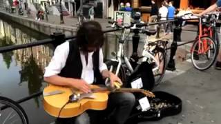 Amazing street musician blues guitarist