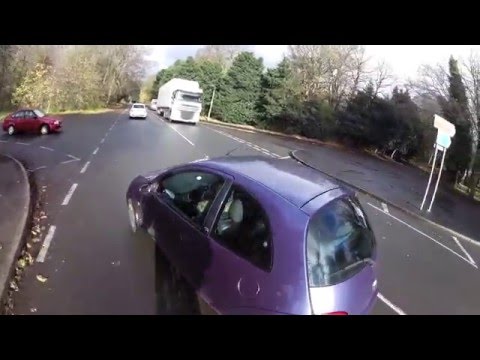 MW55 YHH – driver pulls out on cyclist in a car with no MOT