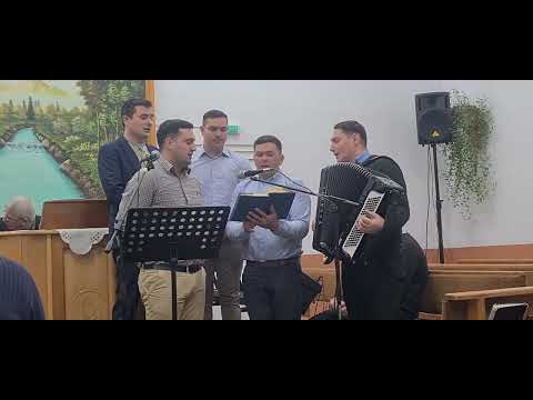 Ioanid Netbai cu un grup de frați ~ În slăvitu-Ţi nume mare...