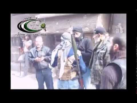 التمركز قبل اقتحام كتيبة الشهيد حسين مفعلاني لأحد مواقع قوات النظام في شارع فلسطين في مخيم اليرموك في مدينة دمشق