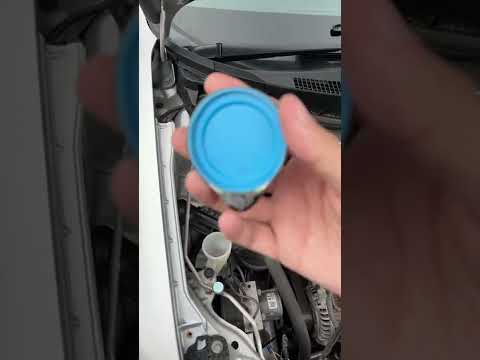 Carbon fiber windshield washer fluid cap