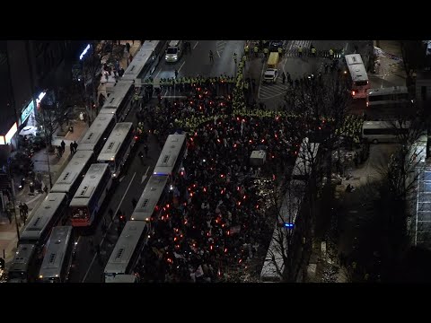 Supporters of impeached South Korean president rally outside court after hearing | AFP