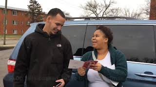 Christmas Card Containing $100 bills Handed Out Randomly By Columbus Police