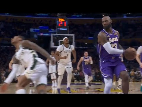 LeBron James looks at KPJ for trying to steal it before dunk vs Bucks 😂