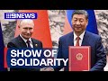 Moscow and Beijing display unity during Vladimir Putin visit | 9 News Australia