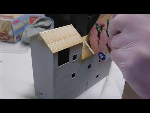 Leila Central - Painting a model railroad building.