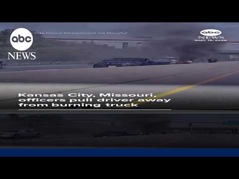 Kansas City, Missouri, officers pull driver away from burning truck