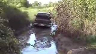 preview picture of video 'Some mudding in Evans Mills / LeRay with Ford F-250 V10'