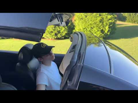 2010 G37 convertible top windshield latch closes early