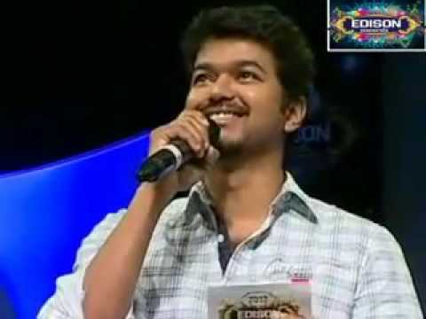 Jayam Ravi getting Edison award 2012 from ilayathalapathi Vijay.