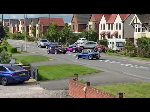 buggies leaving for a VW show
