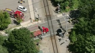 Teen driver hurt after crashing into train in Massachusetts