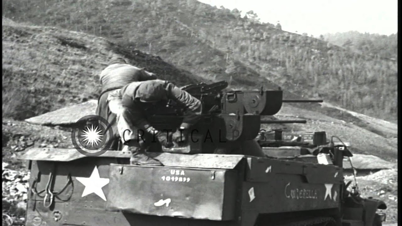 Soldiers fires Quad .50 Caliber Machine Gun targeting on hill and M4 Sherman Tank...HD Stock Footage
