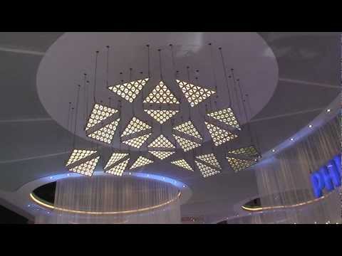 Living Sculpture kinetic light installation with DMX winches and motorized OLED light elements