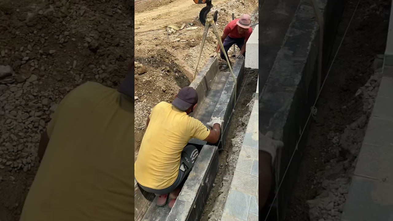 Watch installation of precast drains - the future of drainage.
