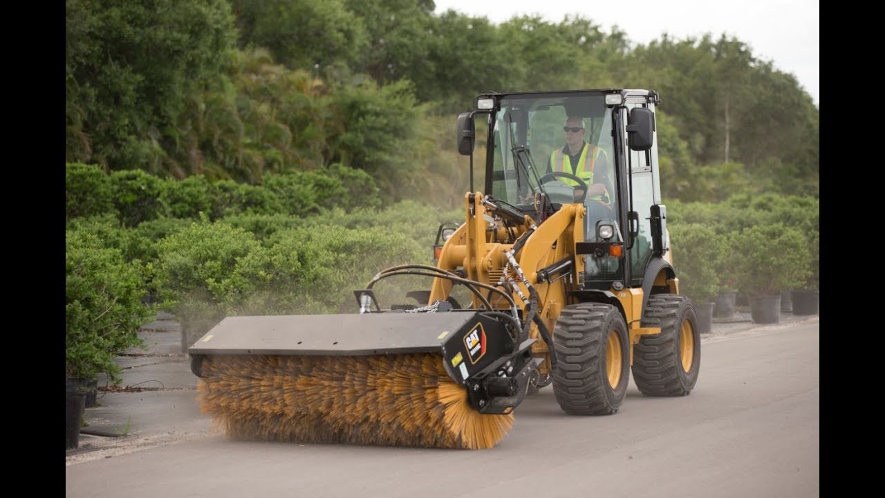 Cat® 903D Compact Wheel Loader | Creep Control, Throttle Lock and Auxiliary Functions