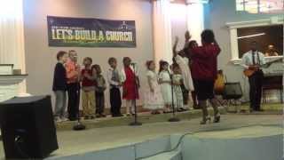 WAF children's choir rise up and praise HIm