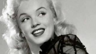 Marilyn Monroe-She Acts Like A Woman Should