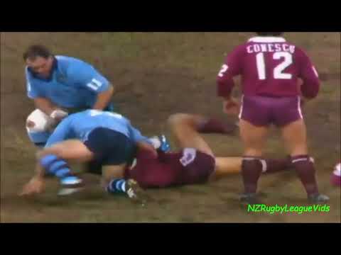 Wally Lewis barges Steve Roach out of the way