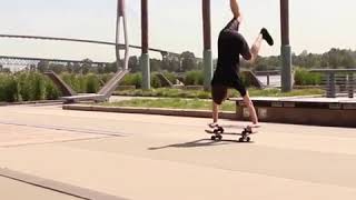 Guy Performs Awesome Trick on Two Skateboards - 986806-1