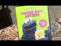 2 Different Versions Of Sesame Street Learning About Letters