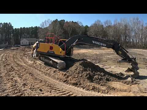 Dredging The Last Bank And Grading The Dam