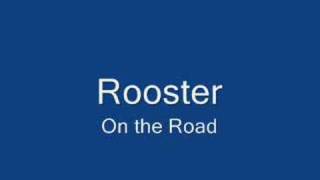 rooster on the road
