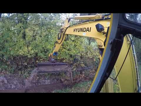 Cleaning Ditch with excavator