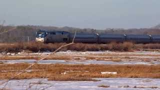 preview picture of video 'Amtrak Downeaster with 3 P42s flies across frozen Scarborough Marsh'