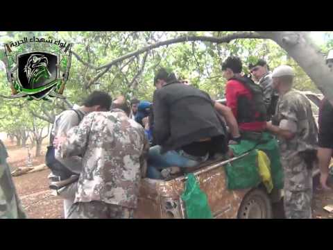 تجهيز مقاتلي لواء شهداء الحرية للرباط بالقرب من تل الخضر في ريف درعا ضمن معركة قطع الوتين