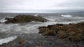 preview picture of video 'Mallaig Rocks Lashed by Sea In Summer Storm'