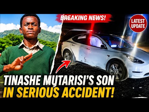 Damaged luxury SUV on a dark Zimbabwe highway, emergency lights flashing