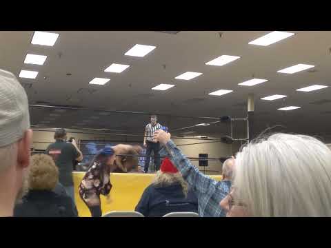 MV Young delivers a superplex and brain buster to Iceman Tony Johnson!