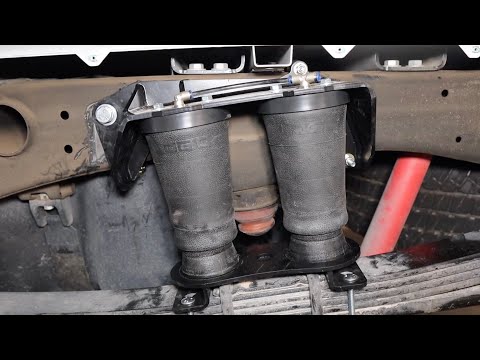 installing ready Air airbags and compressor powered by LOGIQ for a 2023 gmc sierra 2500 at4