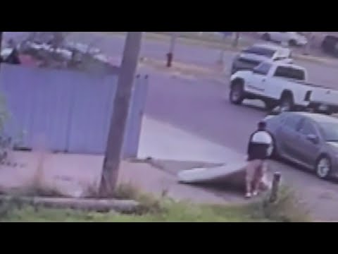 Man caught on surveillance video dragging mattress onto Detroit woman’s property