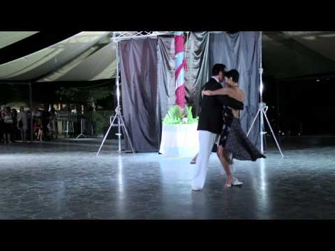  Michelle Erdemsel  and  Murat Erdemsel  are  dancing  to  a  tango