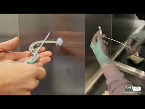 installation of an e-li handrail and Strong Spine on a lift cabin wall