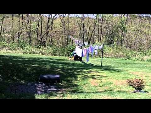 John Deere LA175 cutting some grass.