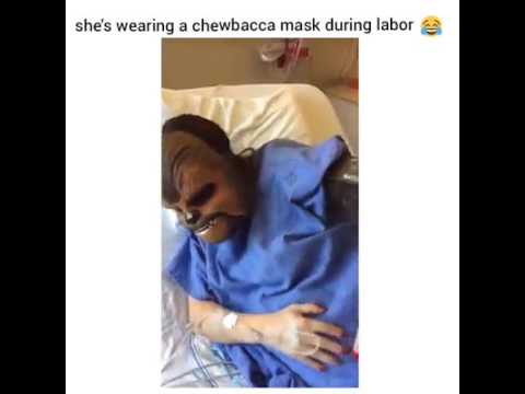 Woman wear a Chewbacca mask during labor