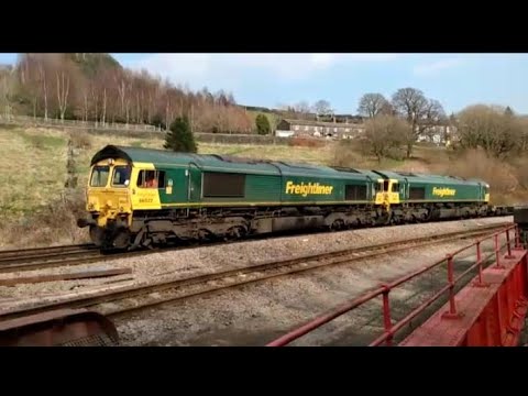 Double headed Class 66s on freight at Marsden