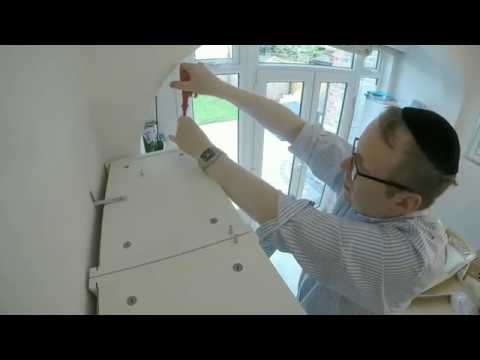 Putting up Ikea bookshelf extensions with the A-Team