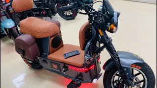 Electric Cruiser 70 mph with Bluetooth music and wireless phone charging
