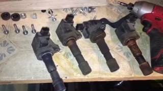 2012 Honda Fit loose spark plugs p0303