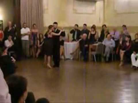 Andrea Misse and Javier Rodriguez are dancing to a tango