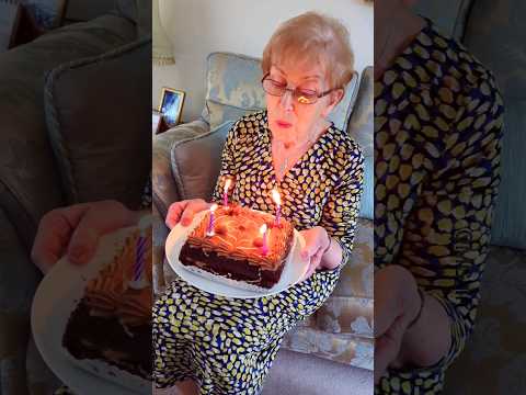 Blowing out the candles.