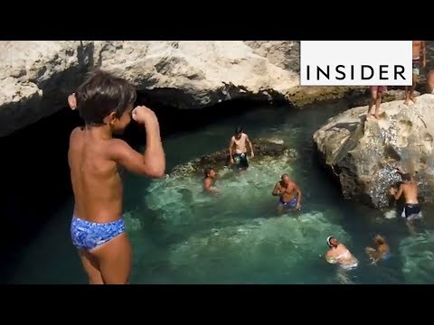 Cliff Jumping At A Grotto In Italy